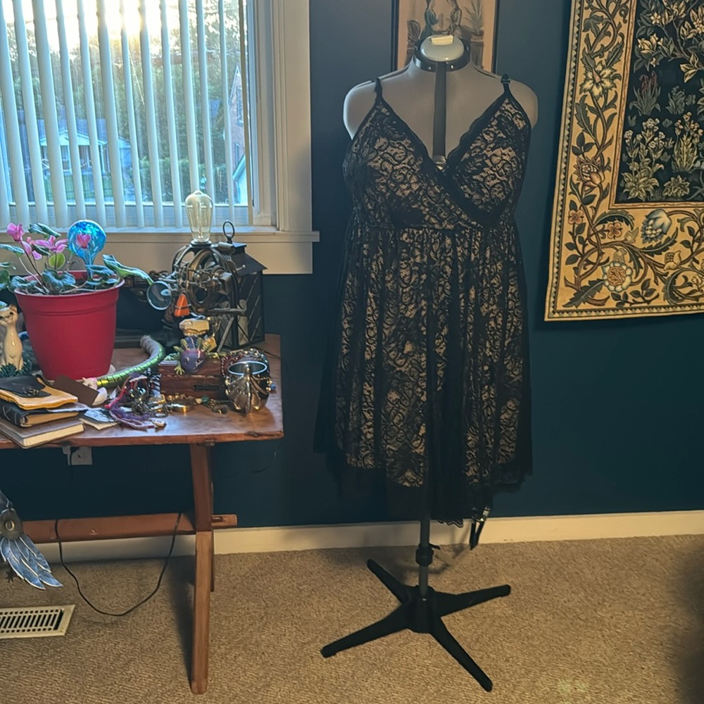 Like New Torrid Size 3 Black Lace Strappy Dress With Tan Lining.